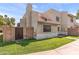 Inviting exterior showcasing a well-maintained lawn and neutral-toned stucco facade, enhancing curb appeal at 222 W Brown Rd # 57, Mesa, AZ 85201