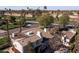 Aerial view of a home featuring a tile roof, multiple chimneys, and well-maintained landscaping at 2233 N 9Th Ave, Phoenix, AZ 85007