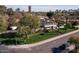 Aerial view of the property featuring manicured lawns, a private backyard, and a charming exterior at 2233 N 9Th Ave, Phoenix, AZ 85007