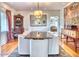 Formal dining room with seating for ten and an elegant chandelier at 2233 N 9Th Ave, Phoenix, AZ 85007