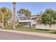 Beautiful two story home with manicured lawn, hedges and trees, and a second story balcony at 2233 N 9Th Ave, Phoenix, AZ 85007