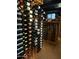 Well-organized wine cellar featuring wooden racks filled with an extensive collection of various wine bottles at 2233 N 9Th Ave, Phoenix, AZ 85007