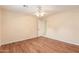 Relaxing bedroom with wood-look flooring and an adjacent bathroom at 2625 W Oakland St, Chandler, AZ 85224