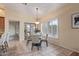 Breakfast nook with sliding glass door and window with shutter at 2625 W Oakland St, Chandler, AZ 85224