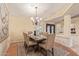 Dining room with chandelier and space for six at 2625 W Oakland St, Chandler, AZ 85224