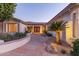 Inviting walkway leading to an ornate double-door entrance with lush landscaping at 2625 W Oakland St, Chandler, AZ 85224