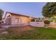 Exterior showing the home's backyard, built-in grill, and grassy area at 2625 W Oakland St, Chandler, AZ 85224