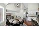 Dining area with a round table, elegant chandelier, and hardwood floors at 3119 E Rosemonte Dr, Phoenix, AZ 85050