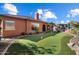 Private backyard features a putting green and outdoor living space at 3132 E Harwell Rd, Phoenix, AZ 85042