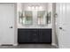 Bathroom with double vanity and matching mirrors at 32815 N Slate Creek Dr, San Tan Valley, AZ 85143