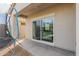 Covered patio featuring a sliding glass door at 35374 W San Sisto Ave, Maricopa, AZ 85138