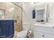 Updated bathroom featuring a tiled shower and vanity with sink at 3611 W Hazelwood St, Phoenix, AZ 85019