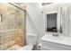 Updated bathroom with walk-in tiled shower, vanity and framed mirror at 3611 W Hazelwood St, Phoenix, AZ 85019