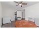 Inviting dining room with space for four, wooden table, and wood look flooring at 3611 W Hazelwood St, Phoenix, AZ 85019