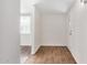 Inviting entryway featuring wood-look tile floors and a glass-paneled front door at 3611 W Hazelwood St, Phoenix, AZ 85019