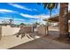 View of covered parking and secure gate to front door at 3611 W Hazelwood St, Phoenix, AZ 85019