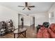 Cozy living room with dark wood floors and ample natural light at 3611 W Hazelwood St, Phoenix, AZ 85019