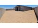 Expansive backyard featuring desert landscaping, framed by block wall for privacy at 3850 N Camden Dr, Florence, AZ 85132