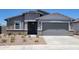 Charming single-story home with neutral stucco, brick accents, and a well-kept xeriscaped front yard at 3850 N Camden Dr, Florence, AZ 85132
