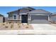 Charming single-story home with neutral stucco, brick accents, and a well-kept xeriscaped front yard at 3850 N Camden Dr, Florence, AZ 85132
