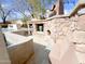 Resort style pool and spa area with outdoor fireplace and water feature at 3912 E Williams Dr, Phoenix, AZ 85050