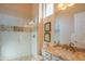 Modern bathroom with a tiled shower and sleek fixtures offers a spa-like experience at 40607 N Candlewyck Ln, Phoenix, AZ 85086