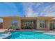 Gorgeous backyard pool and spa, complemented by a covered outdoor living space at 40607 N Candlewyck Ln, Phoenix, AZ 85086