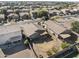 Expansive shot showcases the backyard and nearby homes in this quiet residential neighborhood at 43556 W Colby Dr, Maricopa, AZ 85138