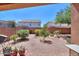 View of the backyard showing a clean and well-landscaped space at 43573 W Blazen Trl, Maricopa, AZ 85138