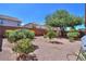 Backyard featuring landscaping and privacy fence at 43573 W Blazen Trl, Maricopa, AZ 85138