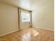 Bedroom features tile flooring, neutral paint and a window for natural light at 4630 N 68Th St # 253, Scottsdale, AZ 85251