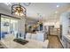 The kitchen shows the dining area and features an open concept design at 4750 S Rhodium Ln, Mesa, AZ 85212