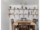 Dining room featuring a wood table with 4 chairs and decorative shelving at 5043 W Christy Dr, Glendale, AZ 85304