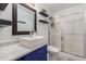 Modern bathroom featuring a new sink, vanity, and walk-in shower at 5256 W Port Au Prince Ln, Glendale, AZ 85306