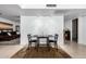 Cozy dining area with modern lighting and tile flooring at 5256 W Port Au Prince Ln, Glendale, AZ 85306