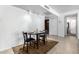 Cozy dining area with modern lighting and tile flooring at 5256 W Port Au Prince Ln, Glendale, AZ 85306