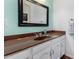 Bathroom with white cabinets, brown sink, and brown countertop at 5726 N 10Th St # 5, Phoenix, AZ 85014