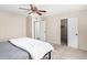 Bedroom with carpet floors, ceiling fan and a walk-in closet at 5726 N 10Th St # 5, Phoenix, AZ 85014