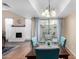 Bright dining area featuring seating for six, a decorative chandelier, and sliding doors at 5726 N 10Th St # 5, Phoenix, AZ 85014