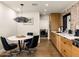 Modern kitchen view with stainless steel appliances and an adjacent breakfast nook at 5807 N 18Th St, Phoenix, AZ 85016