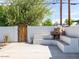 Outdoor seating area featuring a unique fireplace and minimalist design at 5807 N 18Th St, Phoenix, AZ 85016