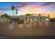 Contemporary home exterior featuring desert landscaping, a two-car garage, and a pathway to the front door at 6440 E Jean Dr, Scottsdale, AZ 85254