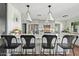 Stylish kitchen featuring a central island, pendant lighting, and modern cabinetry, great for everyday living at 6440 E Jean Dr, Scottsdale, AZ 85254