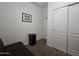 This bedroom features carpet, closet with sliding doors, and neutral wall color at 650 N Hawes Rd # 3827, Mesa, AZ 85207