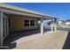 View of a large carport featuring pavers and a car at 650 N Hawes Rd # 3827, Mesa, AZ 85207