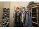 Walk-in closet offering ample storage with shelving and hanging space at 650 N Hawes Rd # 3827, Mesa, AZ 85207