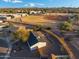 An aerial view of a home with a fenced yard near local schools and recreational fields at 6601 E Latham St, Scottsdale, AZ 85257