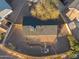 Aerial view of a fenced-in home showing the roof, backyard, and surrounding landscaping at 6601 E Latham St, Scottsdale, AZ 85257