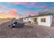 Backyard with gravel, grill and an outdoor seating area at 6601 E Latham St, Scottsdale, AZ 85257