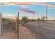 Newly fenced backyard is secure with a combination of wood and chain-link fence at 6601 E Latham St, Scottsdale, AZ 85257